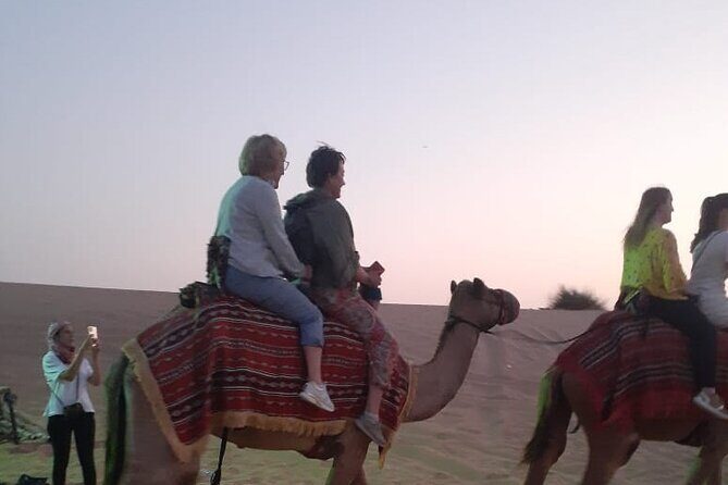 Dubai Desert Safari with Quad Bike, Camel Ride, Dinner and Shows - Sandboarding and why your expectations should match your comfort level