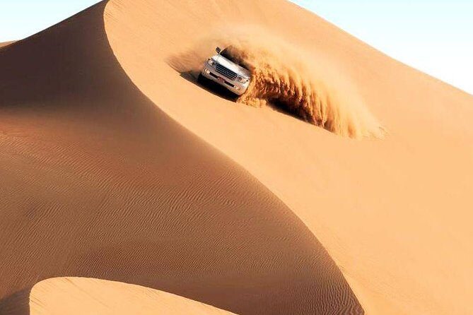 Dubai Desert Safari with Quad Bike & Dune Bashing & Camel Ride & BBQ Dinner - Quad Biking and Dune Bashing: The Part Everyone Remembers