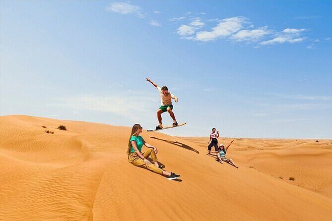 Dubai Desert Safari with Self Drive Quad Biking & Camel Riding - BBQ Dinner, Sheesha, and Live Shows Under Desert Stars