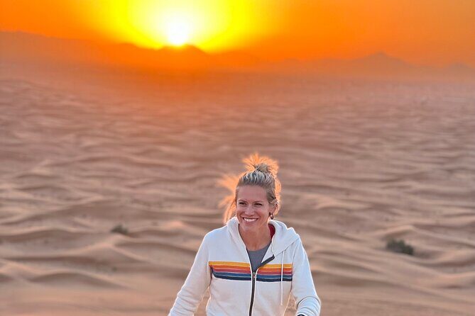 Dubai Desert Sunrise with Dune Bashing & Camel Ride - Sandboarding and Desert Photo Stop: Fun in the Middle of Nowhere