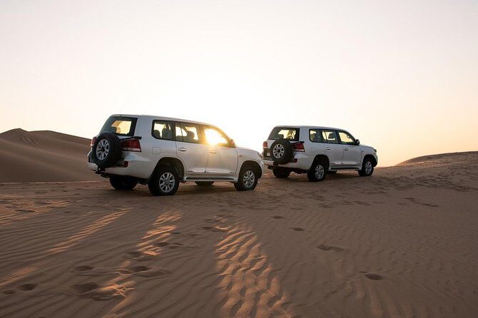 Dubai Desert Trail: Guided Quad/Polaris ATV & Red Dunes Safari - Sandboarding and the camel ride: sand thrills beyond the motors