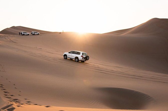 Dubai Desert Trail: Guided Quad/Polaris ATV & Red Dunes Safari - Desert sunset timing: the afternoon slot photo moment