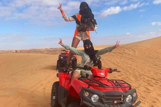 Dubai Dinner Desert Experience with 01 Hour quad bike and camel ride - What You Get for $200: Quad Bikes, Dinner, and a Real Night Program