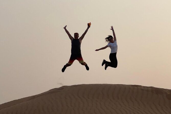 Dubai Elite Red Dunes Safari With Sunset & Bedouin Camp - Getting started: pickup and the air-conditioned ride to the dunes