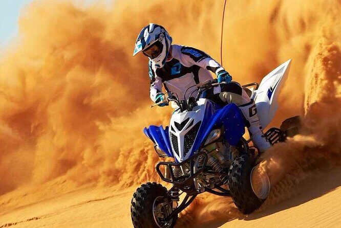 Dubai Evening 4x4 Desert Safari ATV Bike ,Camel Ride , BBQ Dinner - Hotel pickup and the air-conditioned ride into the desert