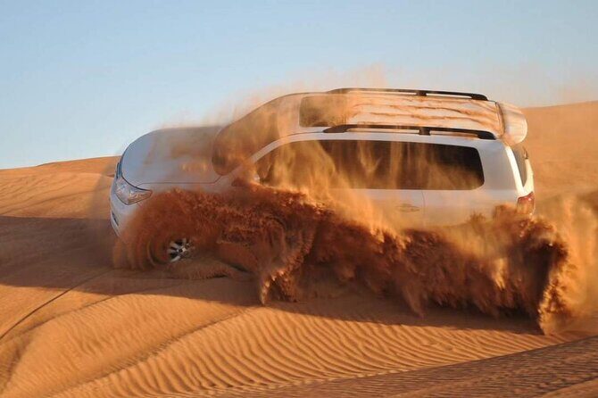 Dubai Evening 4x4 VIP Desert Safari ,Table Service BBQ Dinner - Arriving in a 4WD Land Cruiser Before the Desert Turns Wild
