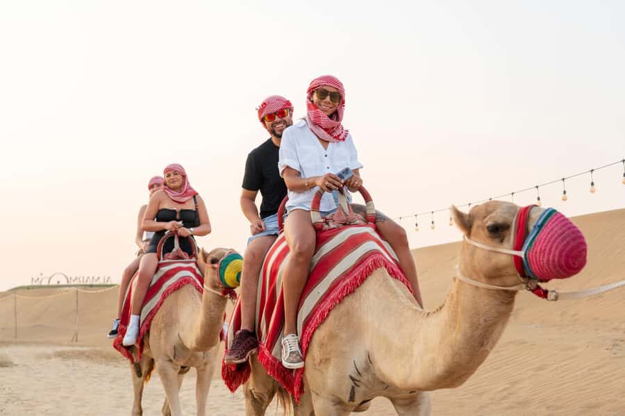 Dubai: Evening Camel Trekking & Dinner at Al Marmoom Oasis - Dinner at camp: BBQ, performances, and optional extras