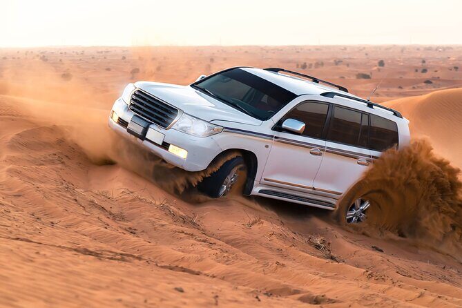 Dubai Evening Desert Safari With BBQ Dinner - The Big Adventure Block: Dune Bashing, Sandboarding, and Camel Ride