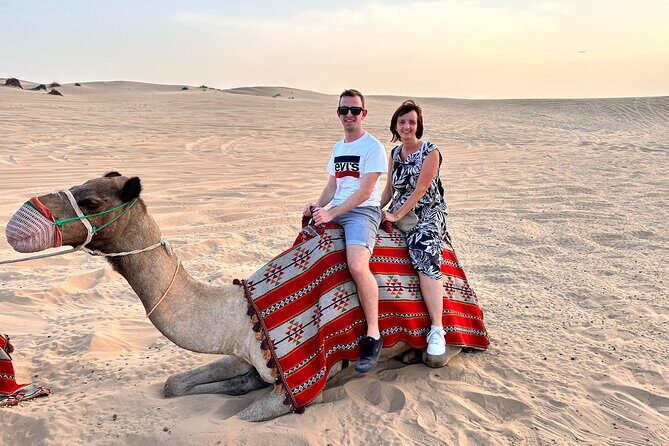 Dubai Evening Desert Safari with Quad bike, Dinner and Show - Tanoura, belly dancing, fire dance, and henna tattoos