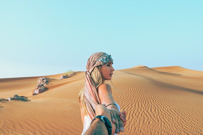 Dubai Evening Desert Safari with RedDune, sandboarding, live show - Sandboarding Fun on the Dunes