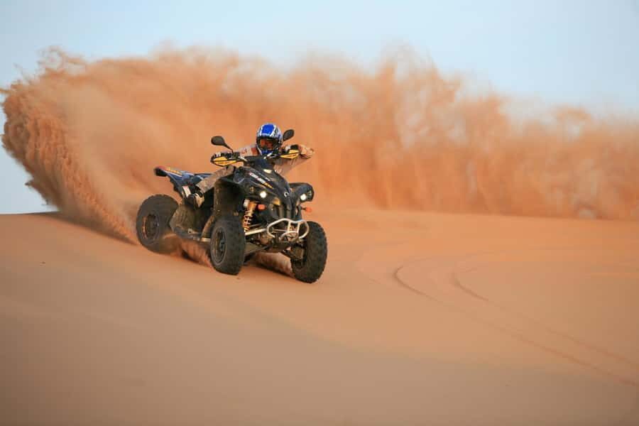Dubai: Evening Tour with Quad Biking, Camel Ride, and BBQ - Lahbab Desert action: dune bashing and sandboarding
