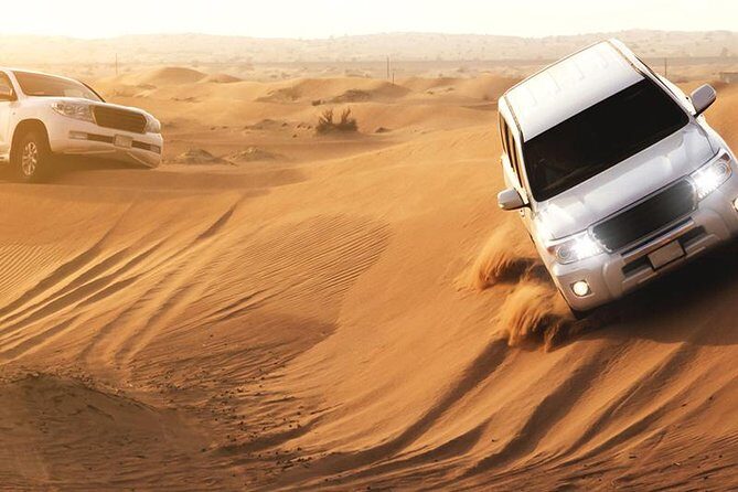 Dubai Evening4x4Desert Safari,BBQ Dinner,4 LiveShows,Camelride - Dune bashing: the 30–40 minute adrenaline hit