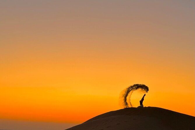 Dubai Fort Lisaili Desert Experience: Camel Ride, BBQ & Transfers - Sunset from a high dune and photos at Hidden Café Dubai