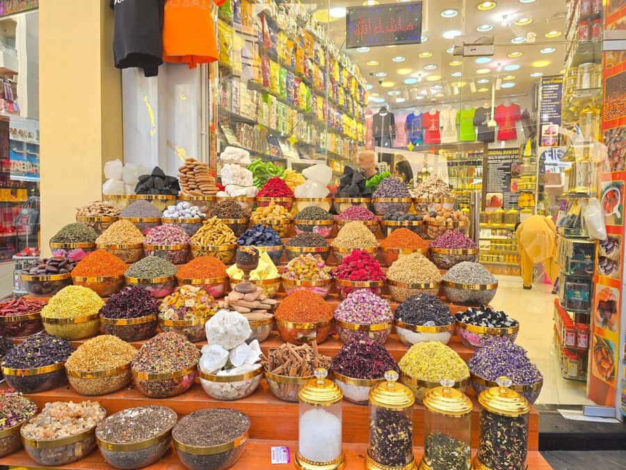 Dubai: Guided City Walking Tour to Spice and Gold Souk - Coffee Museum at the Old City Wall: A Quick Tasting That Sets the Tone