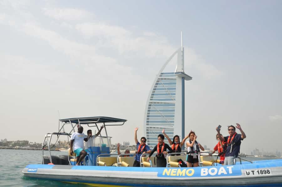 Dubai: Guided Speedboat Tour with City Sights & Ice Cream. - Back toward Burj Al Arab and Burj Khalifa from the sea