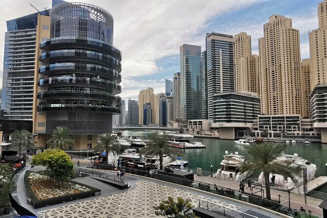 Dubai Half-Day City Tour with Burj Khalifa Ticket - Dubai Spice Souk and Gold Souk: Fast Browsing With Real Senses