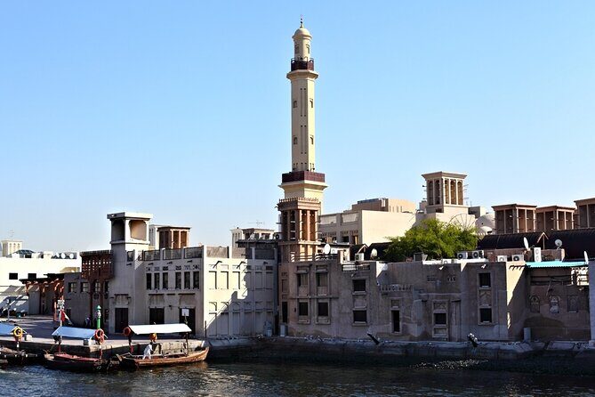 Dubai Half Day Tour with Entry Ticket to Burj Khalifa at the Top - Al Fahidi Fort: old Dubai in a small dose
