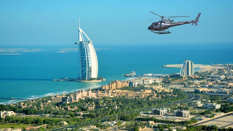 Dubai: Helicopter Ride, Desert Safari, Camels & Refreshments - Camel Ride in the Open Desert: The Calm Contrast