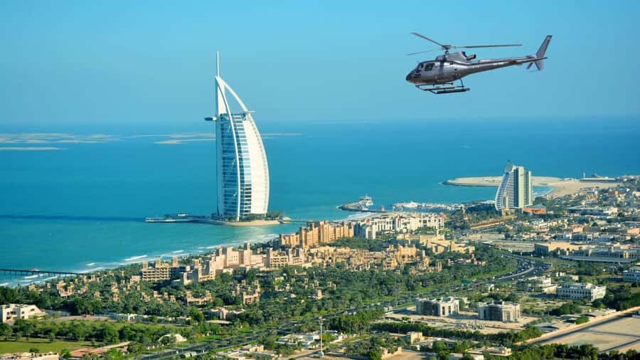 Dubai: Helicopter Ride, Old Town Walking Tour, Abra & Snacks - A 12-minute helicopter that hits the wow factor early
