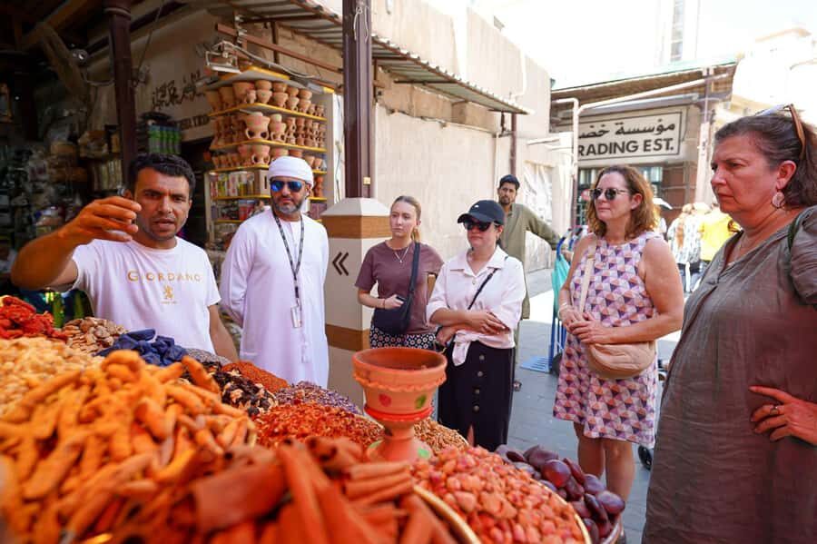 Dubai: Helicopter Ride, Old Town Walking Tour, Abra & Snacks - Old Dubai walking: Al Fahidi’s wind towers and Al Seef views