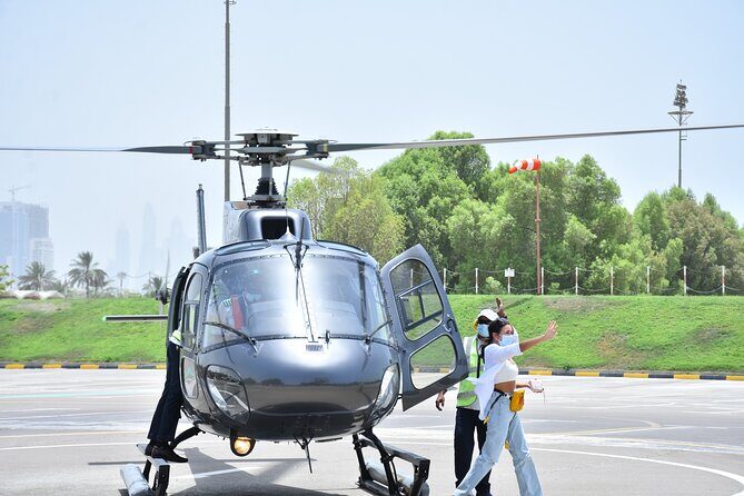 Dubai Helicopter Tour: Experience Dubai’s Iconic Landmarks - Route highlights: Burj Al Arab, The World Islands, Palm, Atlantis, and Burj Khalifa