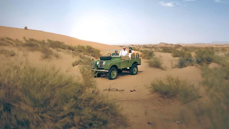 Dubai: Heritage Desert Safari wtih Overnight and Breakfast - A 1950s Land Rover in Dubai Desert Conservation Reserve