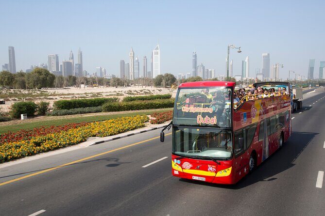 Dubai HOHO Bus Tour, Dhow Cruise & Lost Chambers Aquarium Options - Onboard comforts, audio guide, and how to use the top deck