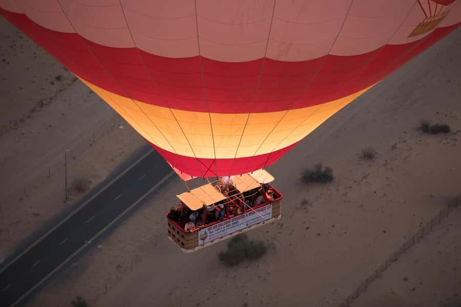 Dubai: Hot Air Balloon Ride with Camel Ride & Falcon Show - Floating above the Dubai Desert Conservation Reserve at sunrise