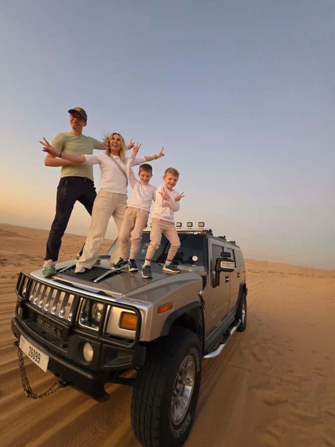 Dubai Hummer Safari Adventure & Traditional Dress Photoshoot - Photo stops, sandboard time, and why they plan for sunset