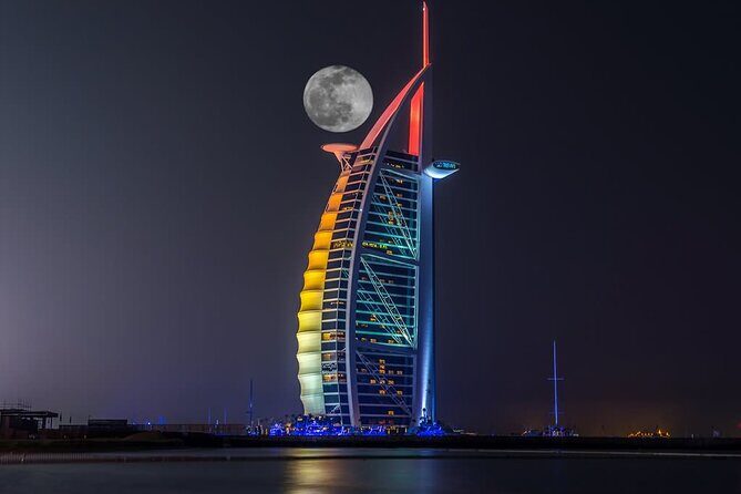 Dubai Inside Burj Al Arab Tour Including Food and Transfer Option - Arrival flow: Jumeirah Beach Hotel start, buggy bridge photo stop, and admission