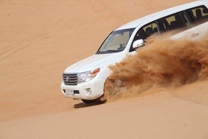 Dubai: Jeep Desert Safari, Camel Ride, and Quad Bike Tour - Al Aweer Camp BBQ and traditional entertainment: optional but worth considering