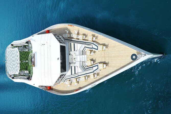Dubai: Lotus Mega Yacht 3-Hours Dinner Cruise Tour - Entertainment Zones and Music: Lively Without Being a Nightclub