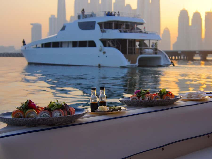 Dubai: Luxury Private 50 FT Yacht Cruise + Optional Sushi - Onboard comfort: air-conditioning, restroom, shower, and sunbeds that actually matter