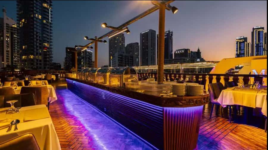 Dubai Marina: Alexandra Dhow Dinner Cruise with Live BBQ - Your evening timeline: Mosque start, welcome, sightseeing, and dance shows