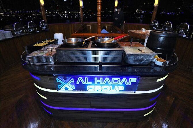 Dubai Marina Luxurious Dhow Cruise Dinner International Buffet - Passing JBR and Cayan Tower: architecture you can spot fast