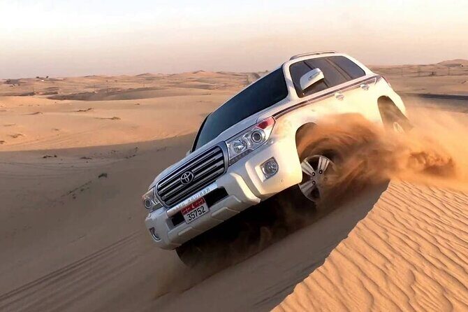 Dubai Morning Desert Safari: Camel Ride & Sandboarding! - Sandboarding: the included activity that turns you from watcher into doer