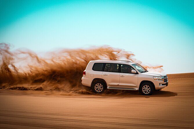 Dubai Morning Evening Desert Safari,Sand boarding and Camel ride - Dune Bashing on the High Red Dunes: Fun With Real Skill