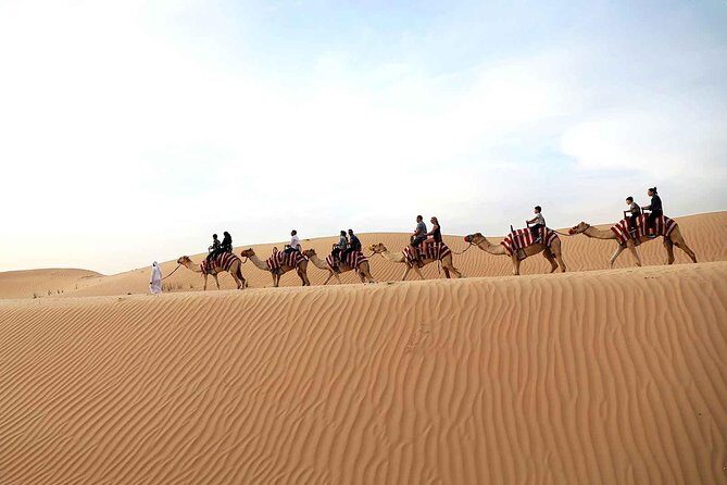 Dubai Morning Red Dunes with Camel Safari & Sandsurf - Pickup, 4WD Land Cruiser, and the Dune Bashing Hit