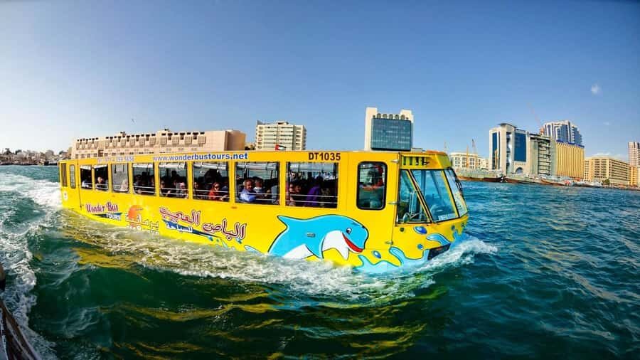 Dubai: Old town tour with Wonder Bus, souks, Creek and Guide - Heritage Village, textile area, and the feeling of a working neighborhood