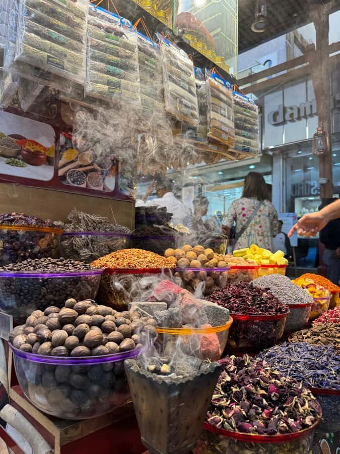 Dubai: Old Town Walking Tour with Abra Cruise & Street Food - Textile Souk, Gold Souk, and spice market: shopping with a guide