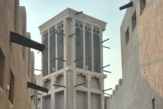 Dubai Old Town Walking Tour with Abra ride, Spice and Gold Souk - Al Fahidi Historical Neighbourhood and Fort: wind towers and 1780s walls