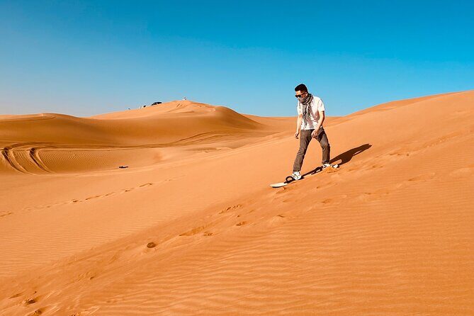 Dubai Premium Desert Safari Red Duns Camel sandbord & Premium BBQ - From hotel pickup to Lahbab Red Duns in a luxury 4x4