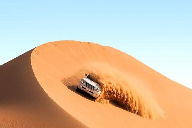 Dubai Premium Red Dunes Safari Camel Ride and BBQ Dinner - Getting picked up in Dubai: private car, not a long scramble