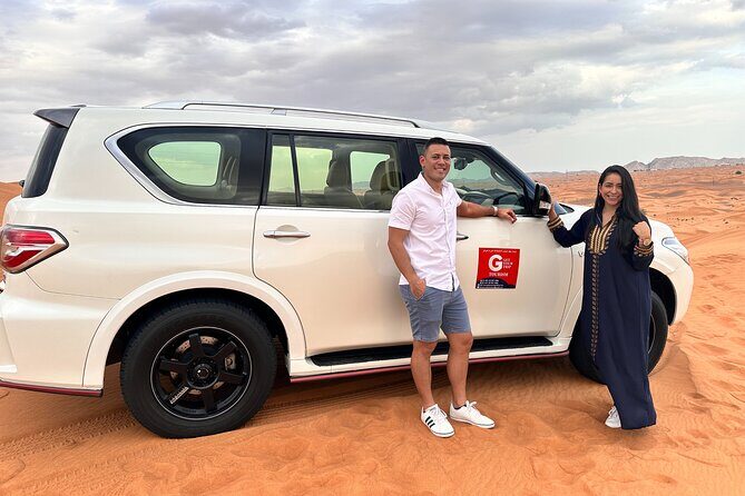 Dubai Private 4x4 Car Desert Safari with Dinner, Camel, and Show - Camel Ride Plus the Big Night Show (Belly Dance, Fire, Tanoura)