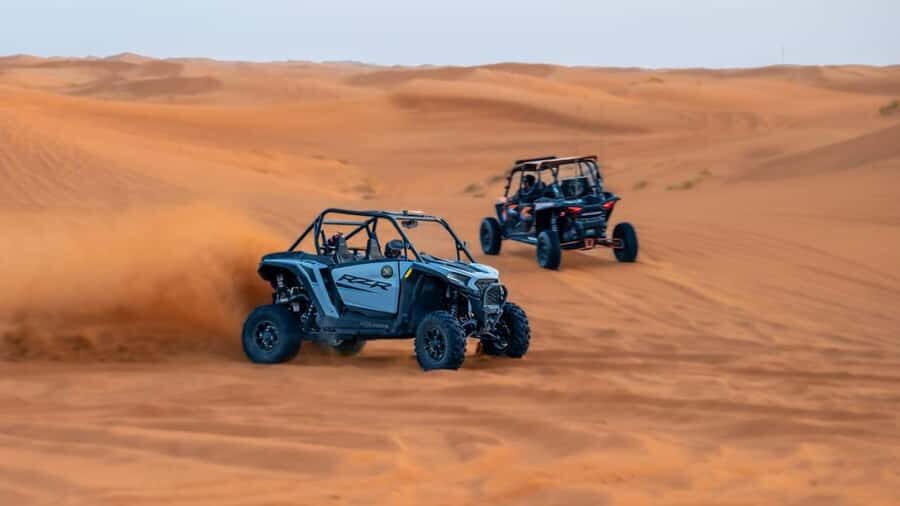 Dubai: Private Dune Buggy, Camel Ride, and Sand Boarding! - A private Polaris buggy and desert sunset in Dubai