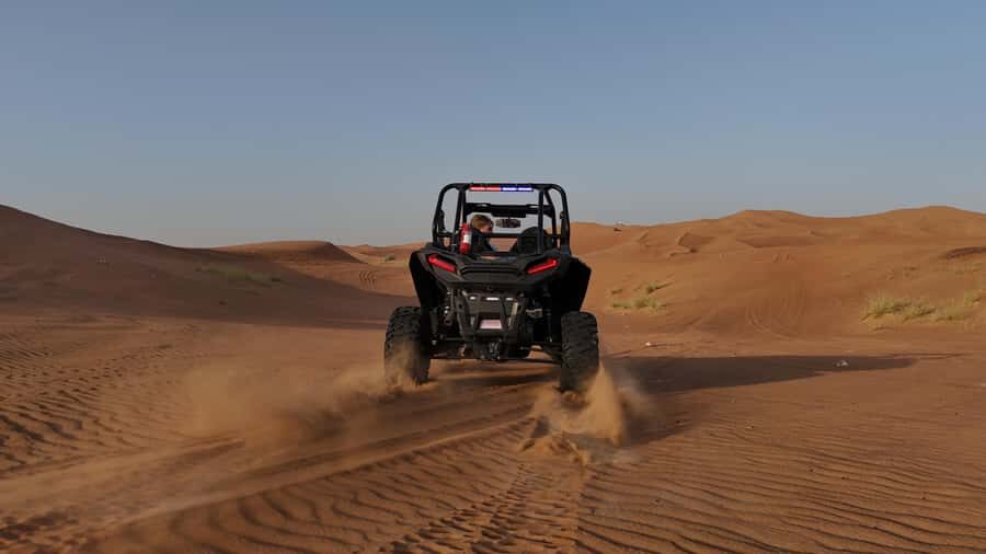Dubai: Private Dune Buggy, Camel Ride, and Sand Boarding! - Desert basecamp comfort: AC, lounges, and those big-sky views