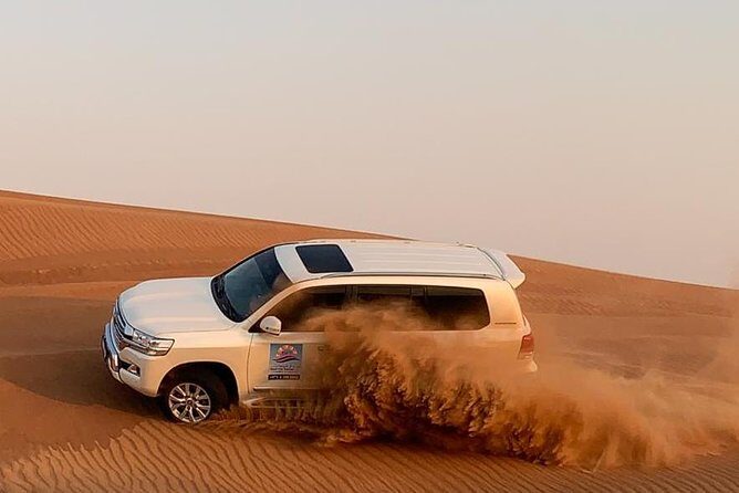 Dubai Private Morning Desert Safari: Camel Ride & Sandboarding - Dune bashing in a 4x4 Land Cruiser: the thrill, explained