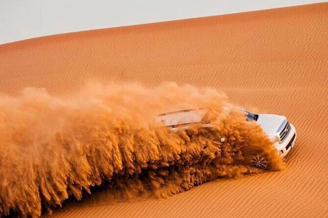 Dubai Private Morning Desert Safari: Camel Ride & Sandboarding - Sandboarding after the climb: switching from adrenaline to play