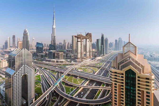 Dubai Private Tour to Major Attractions Photo stop for 6-7 hours - Pickup, vehicle comfort, and why punctuality matters in Dubai