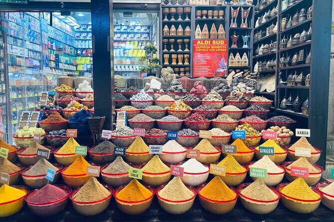 Dubai Private walking Tour Highlights & Hidden Gems - Old Textile Souk, Meena Bazaar, and Indian community influence: the trading story behind the shopping